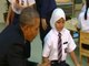 Obama meets refugees in Malaysia