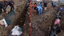 Rus saldırısı sonrası yerle bir olan Mariupol'de ölen insanları gömmek için toplu mezarlar açıldı