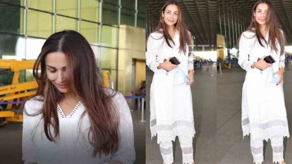 Malaika Arora सफेद कुर्ता पहनकर airport पर लगी शरमाने; Video viral  | FilmiBeat