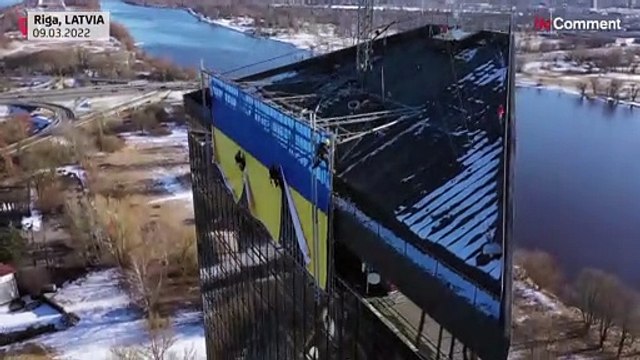 Giant Ukrainian flag unfurled in Latvian TV and in front of Russian embassy in Washington