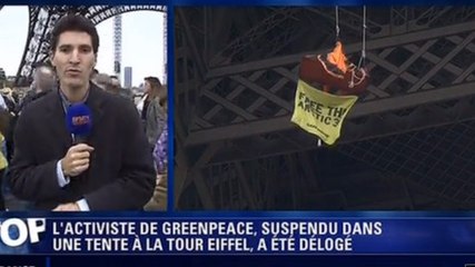 Greenpeace : Deux militants suspendent leur tente à la tour Eiffel