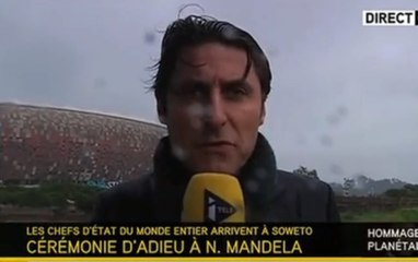 i-Télé : Un journaliste transi de froid pour le direct de l'hommage à Nelson Mandela