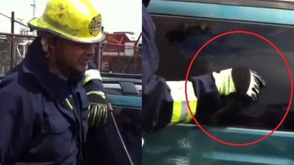 Ce pompier brise la vitre d'une voiture... avec un seul doigt !