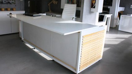 Un bureau qui permet de faire la sieste au travail