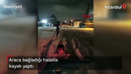 Araca bağladığı halatla kayak yaptı!