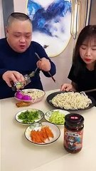 funny Chinese  husband and wife food eating Mubarak
