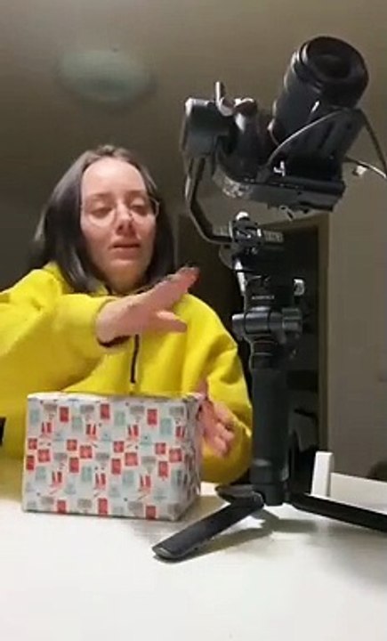 Interaction between a person & her camera