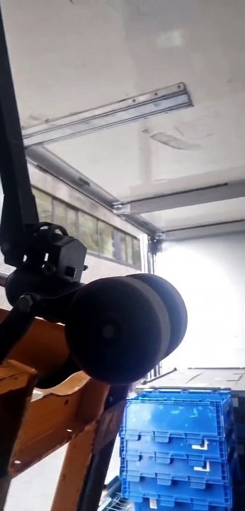 Pallet Wheel Gets Thoroughly Stuck in the Ceiling