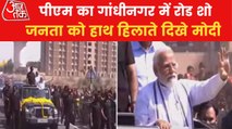 PM Modi performs road show in Gujarat's Gandhinagar