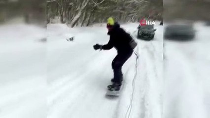Sarıyer'de bir kişi araca bağladığı iple kayak yaptı
