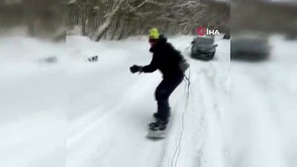 Sarıyer'de bir kişi araca bağladığı iple kayak yaptı