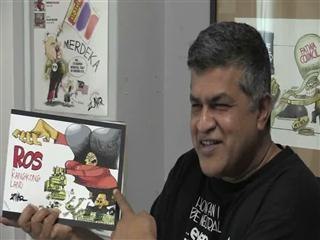 Malaysian cartoonist defiant 'to the last drop of my ink'