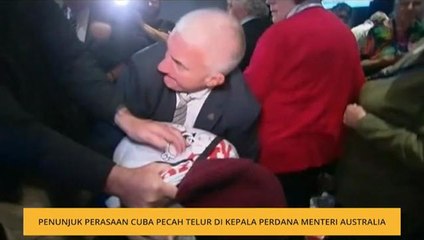 Penunjuk perasaan cuba pecah telur di kepala Perdana Menteri Australia