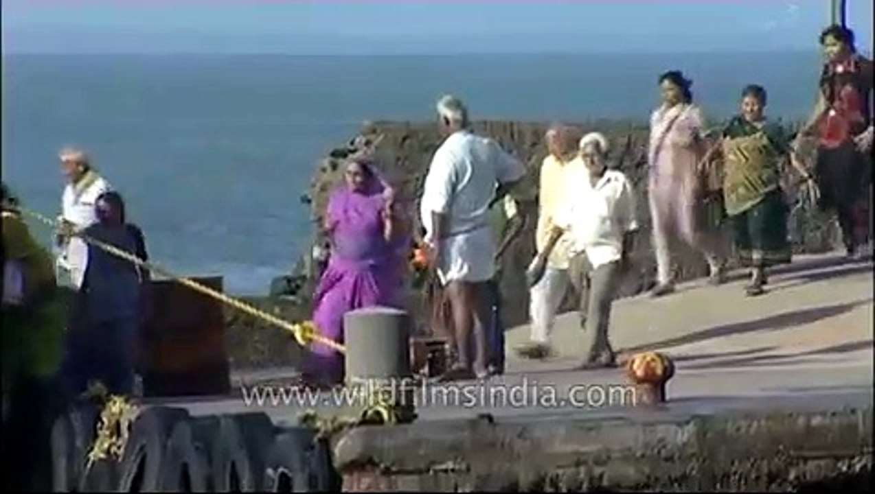 Visitors going back to their boat after visiting Kanyakumari Temple