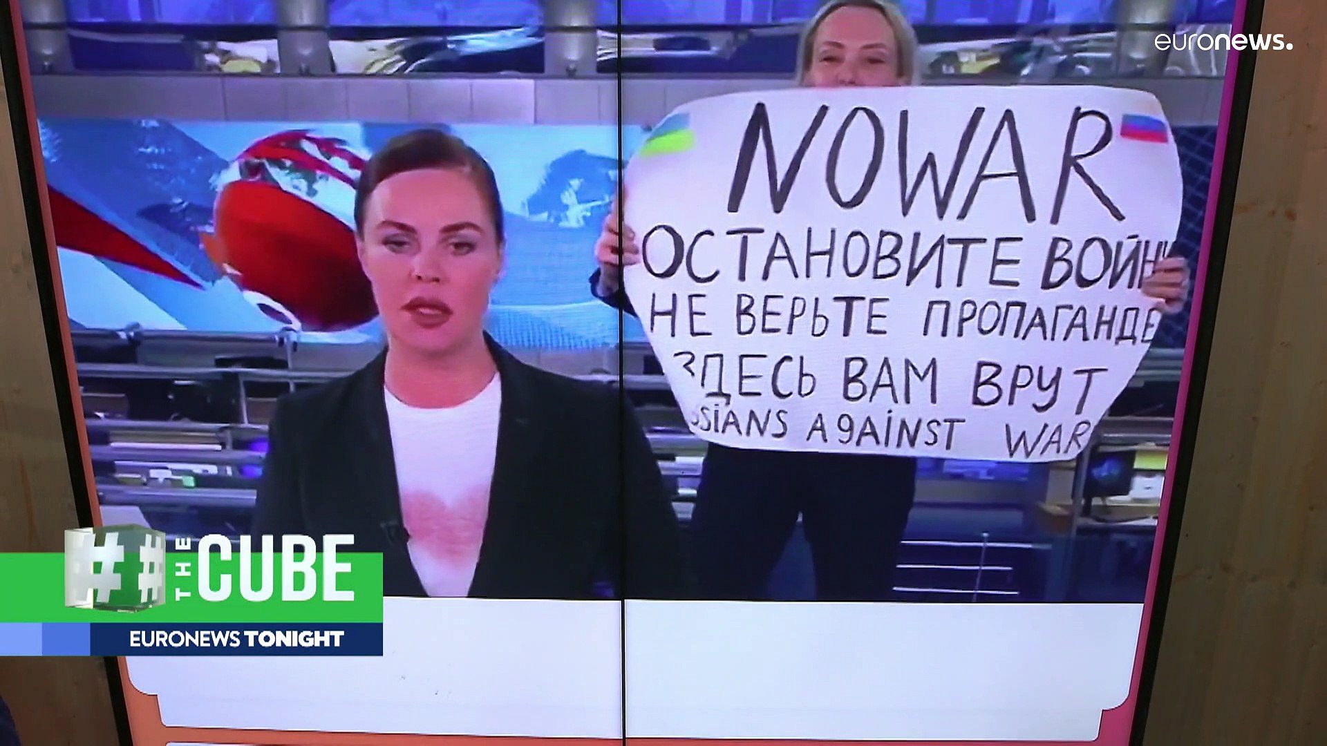 Ukraine war: Russian anti-war protester interrupts state TV news broadcast