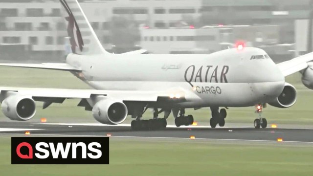 Hair-raising moment Qatar Airways jet navigates bumpy landing with its wheels lifting right off the tarmac