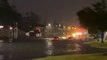 Cars struggle through flash flooding in Texas