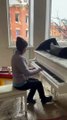 A lady plays the piano for the last time before leaving her house | Ukraine war