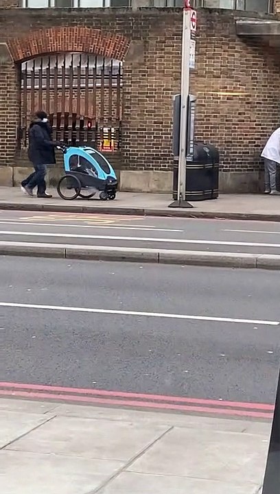 Storm Eunice Blows Away Pedestrians