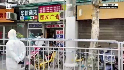 Shanghai seals off street as city battles worst virus outbreak in two years