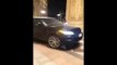 A Saudi girl driving a Range car in front of the Ritz-Carlton Hotel in Riyadh