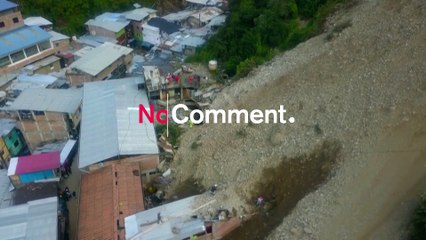 Aftermath of landslide in Peruvian Andes that buried dozens of homes