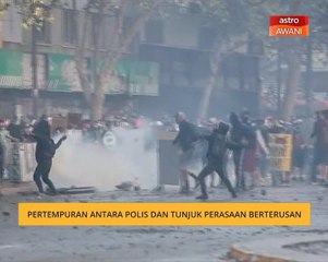 Pertempuran antara polis dan tunjuk perasaan berterusan