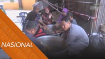 Keadaan banjir tidak menghalang aktiviti gotong royong