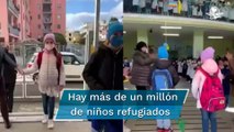 Dan a niños ucranianos refugiados en Italia emotiva bienvenida en escuela