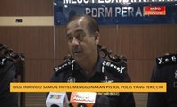 Dua individu samun hotel menggunakan pistol polis yang tercicir