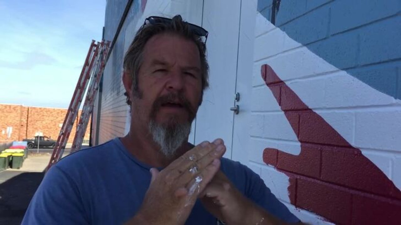 Simon Thomas of Chalk Talk talks about the mural at Club Sapphire