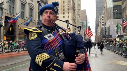 Rainy day feels like home for international visitors to NYC’s St. Patrick’s Day Parade
