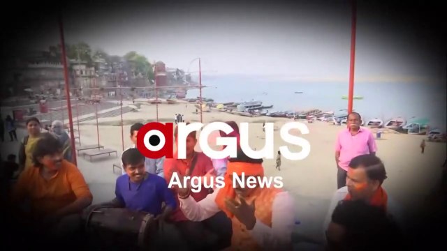 Musically Holi Celebration by Local Artists at Ganga Ghat in Varanasi, Uttar Pradesh