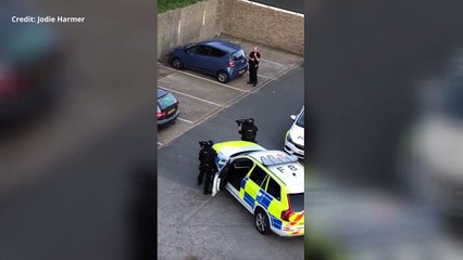 Armed police swoop on a suspect car