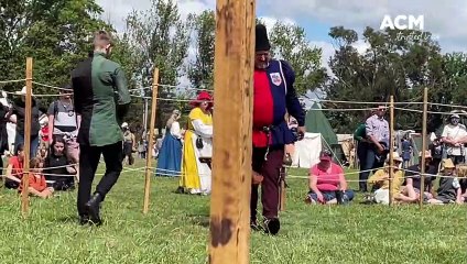 Medieval Faire sword fight and grappling