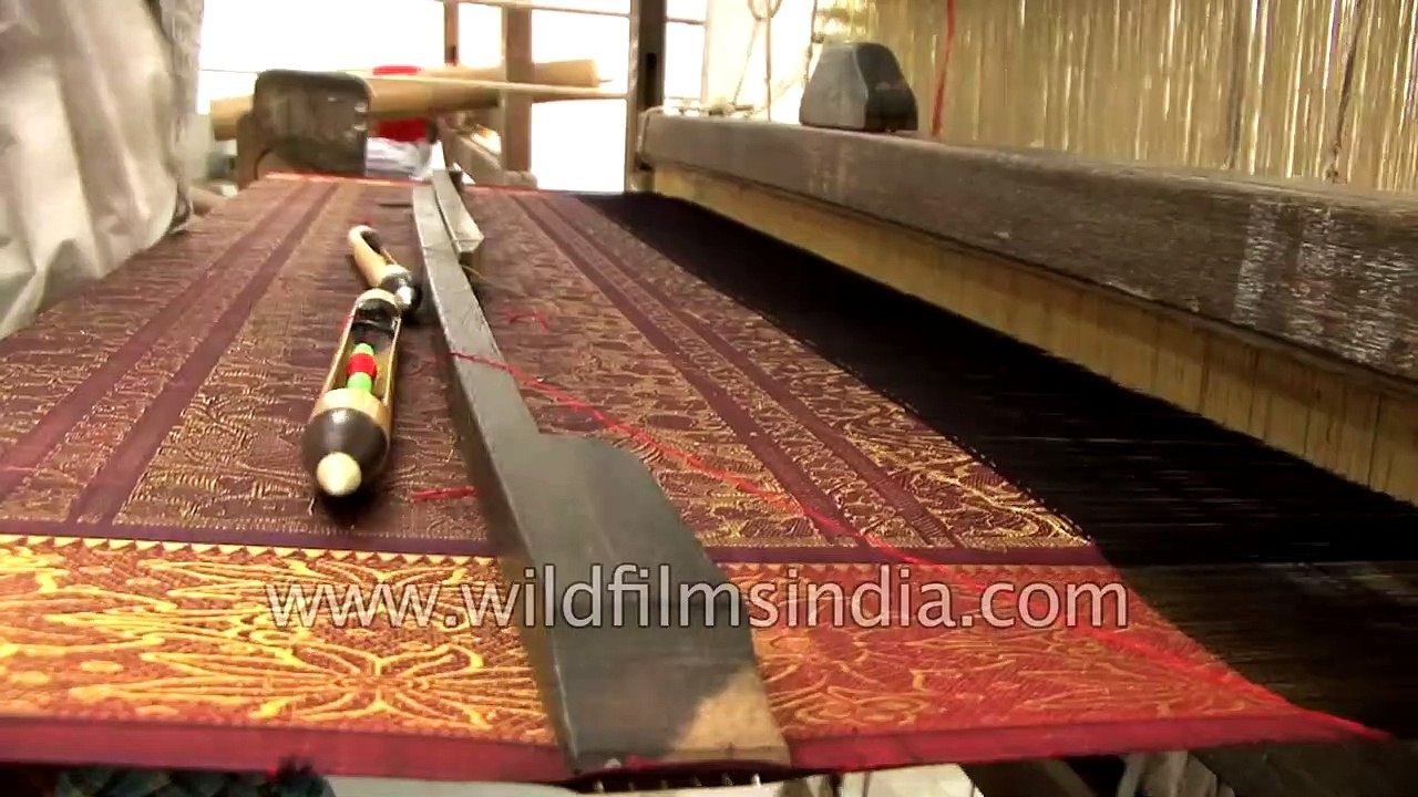 Worker at a silk weaving factory in Tamil Naidu