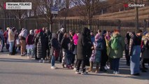 Ukrainian refugees queue up for Polish ID number