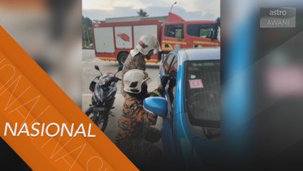 Bomba selamat kanak-kanak perempuan terperangkap dalam kereta