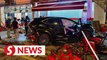 Car crashes into restaurant, ten injured