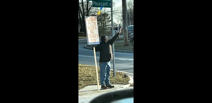 Guy at Stoplight Shares Opinion of Vladimir Putin on Sign