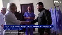 Volodymyr Zelensky visits family hit by Russian shelling