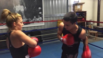 Garth works pads with Alanah