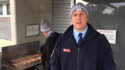 Daily Advertiser - Cops' Mark Hughes beanie fundraiser