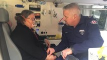 Andrew Ambulance treating a woman for asthma symptoms