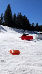 Woman Sledding Loses Control and Hits Ice Block