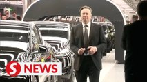 Dancing Musk hands drivers first Teslas from new German gigafactory