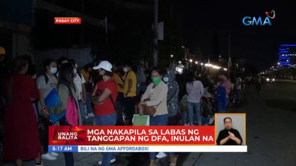 Mga nakapila sa labas ng tanggapan ng DFA, inulan na | UB