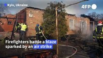 Kyiv emergency crews battle blaze sparked by Russian strike