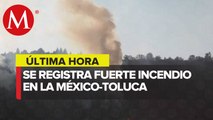 Bomberos de CdMx sofocan incendio forestal en Autopista México-Toluca; no hay lesionados