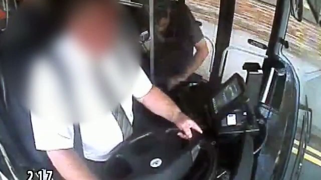 Shocking footage shows moment crazed passenger grabbed bus wheel as it travelled along road before being detained by off-duty cop